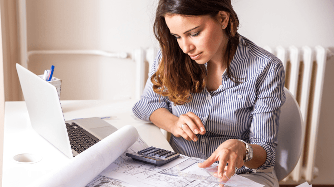 architect woman working on plans
